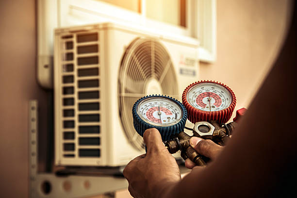 Professional Heat Pump Repair technician working in Bronx, NY